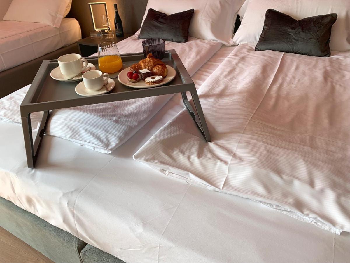 Guest House Le Cassandre Sondrio Bagian luar foto